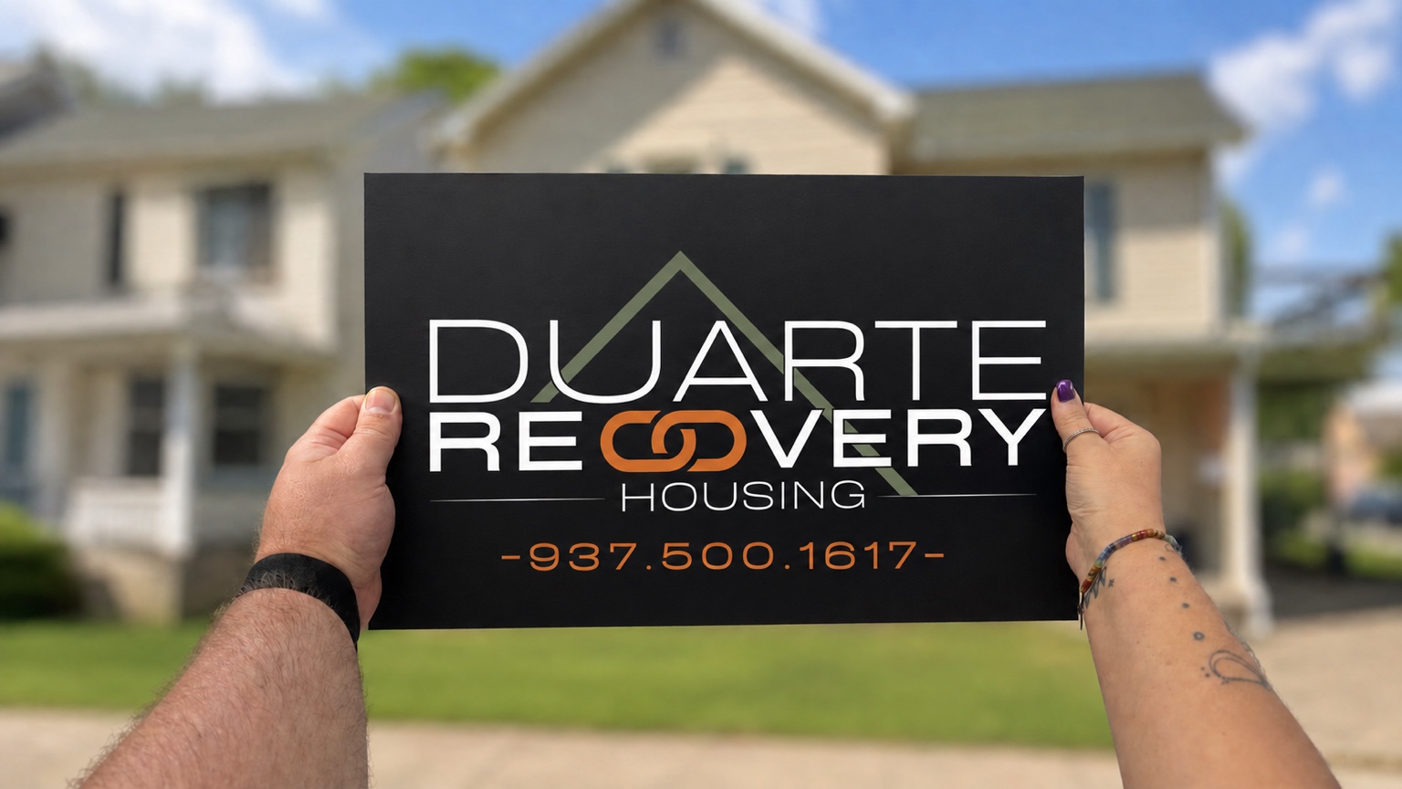 Duarte Recovery Housing sign held in front of the Miamisburg home